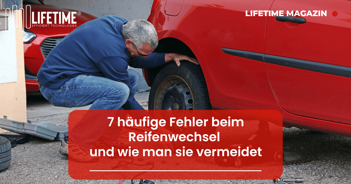 Mann führt Reifenwechsel durch